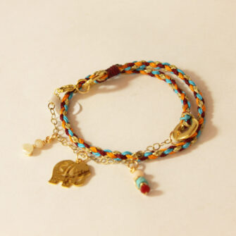 Pulsera “Elefante de Luz” – Trenzada Multicolor con Dijes Dorados y Piedras Naturales